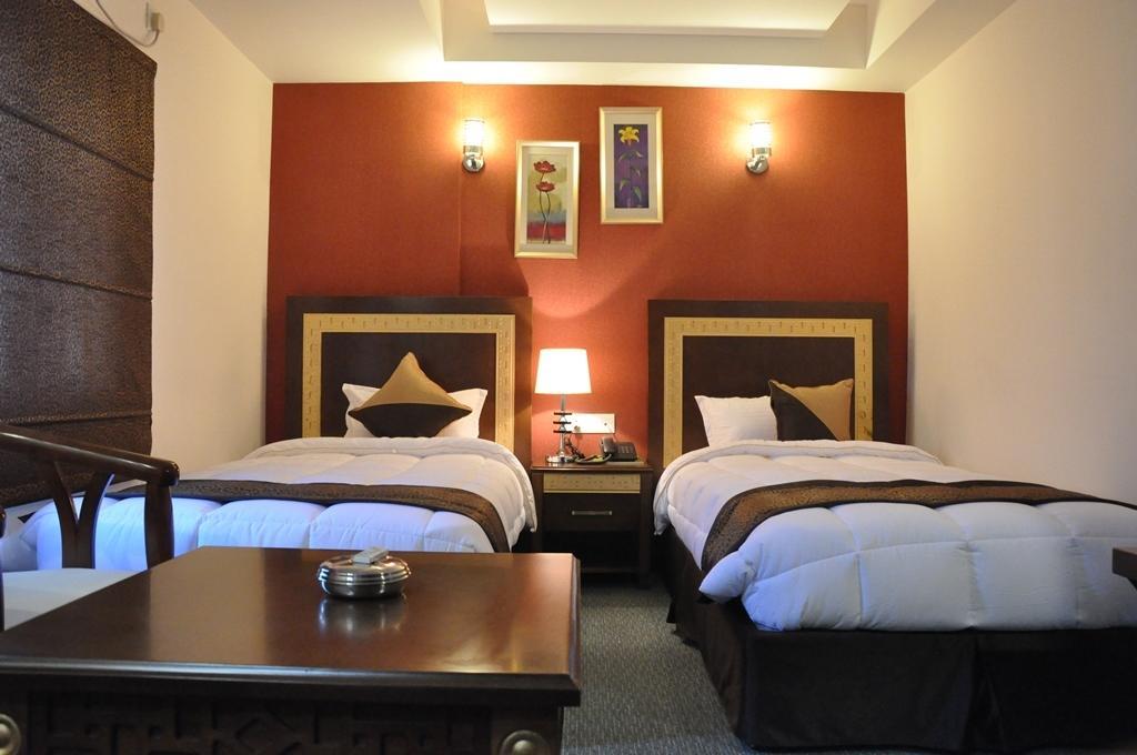 Silk Route Hotel Guwahati Bilik gambar